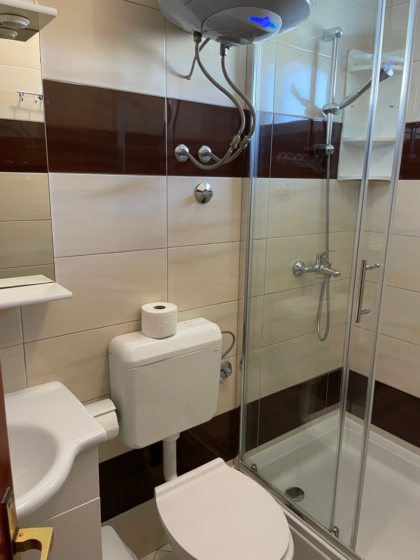 Bathroom with a shower and toilet.